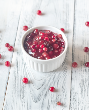 A bowl of cranberries as featured in Snack Baby's Superfood Waffles dog treats with Cranberries for urinary support